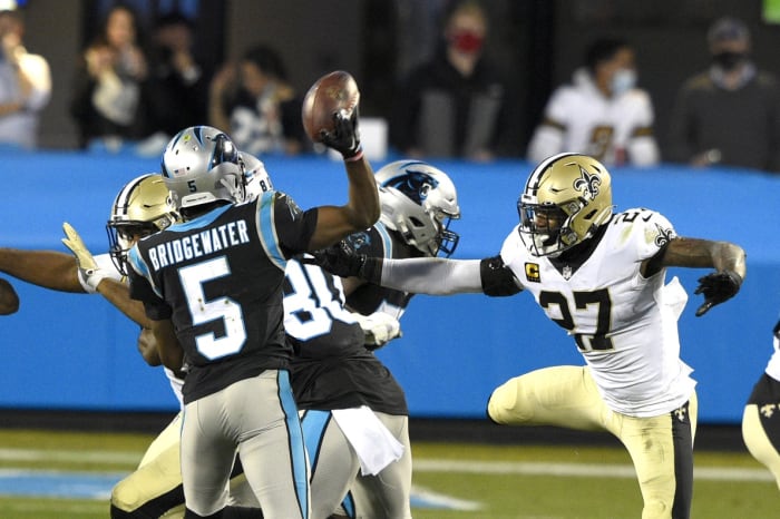 Carolina quarterback Teddy Bridgewater (5) looks to pass as New Orleans Saints safety Malcolm Jenkins (27) pressures. Mandatory Credit: Bob Donnan-USA TODAY